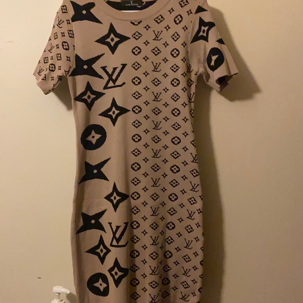 Light brown Sweater dress with black designs